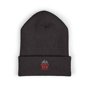Ricky’s Rub Beanie – Classic Cuffed Winter Hat in blue with logo stitched on the front.