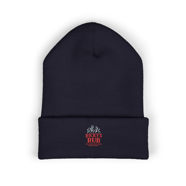 Ricky’s Rub Beanie – Classic Cuffed Winter Hat in blue with logo stitched on the front.