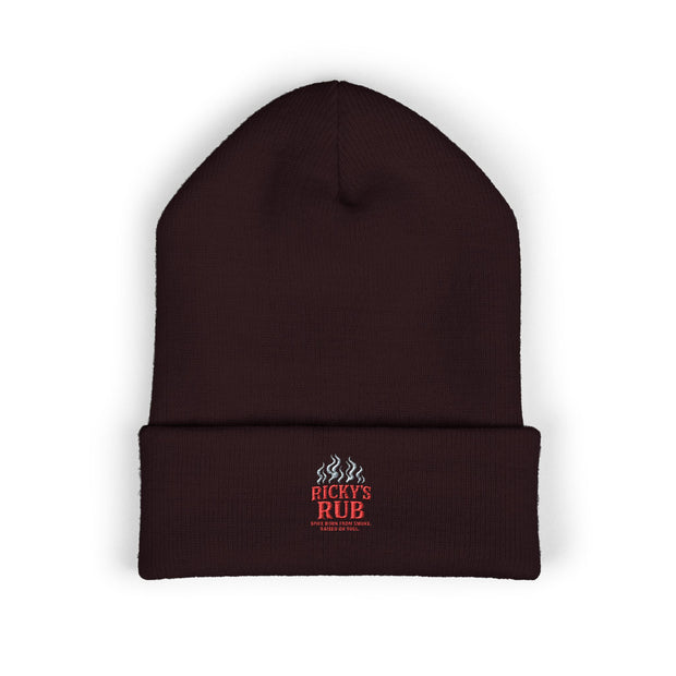 Ricky’s Rub Beanie – Classic Cuffed Winter Hat in blue with logo stitched on the front.