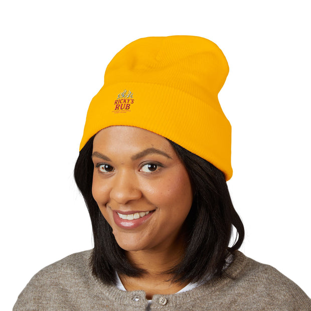 Ricky’s Rub Beanie – Classic Cuffed Winter Hat in blue with logo stitched on the front.